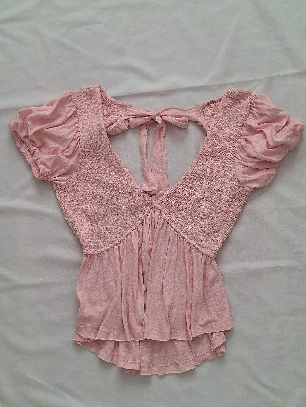 Free People Light Pink Smocked V-Neck Peplum Blouse